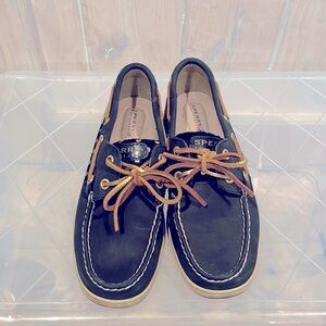 Black Sperry boat shoes with gold polka dots